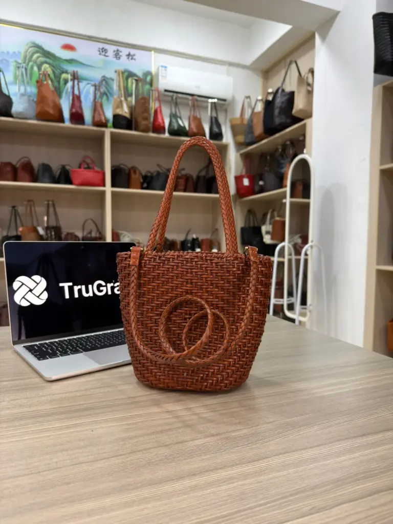 Brown woven bucket tote with two braided handles and a coiled long strap (TG-90664)
