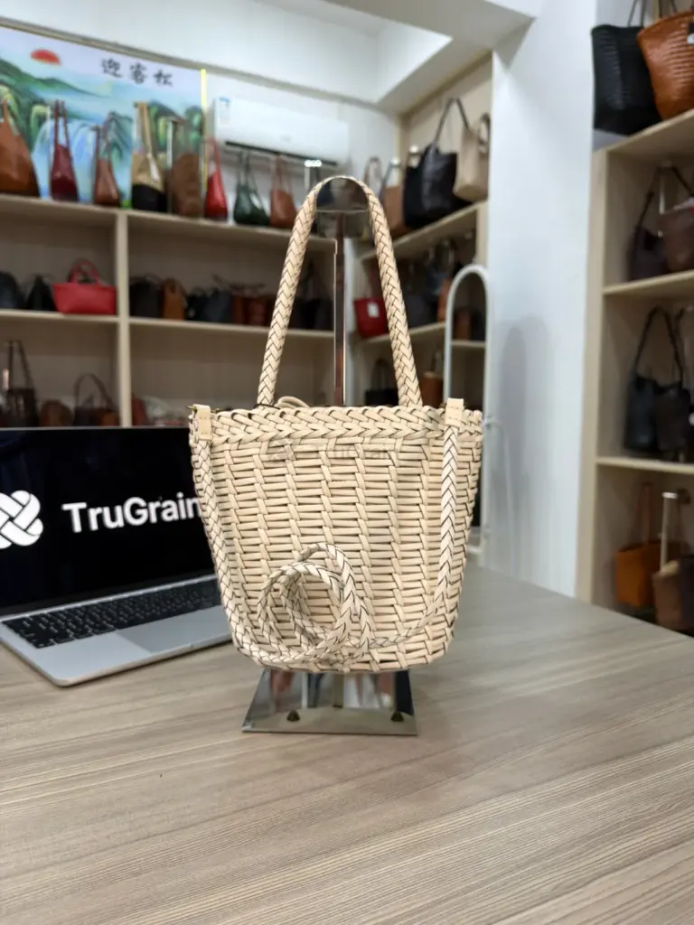 Cream woven bucket tote with braided handles and a coiled long strap (TG-90742)