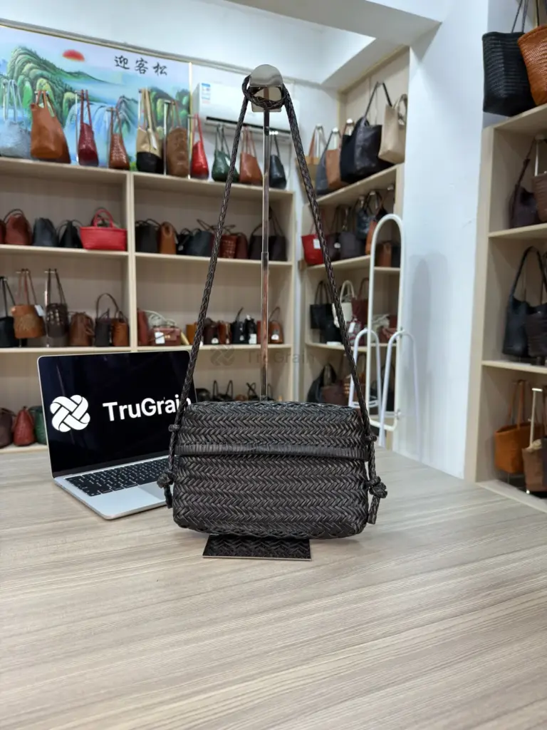Black rectangular woven bag with a top flap and long strap (TG-90915)