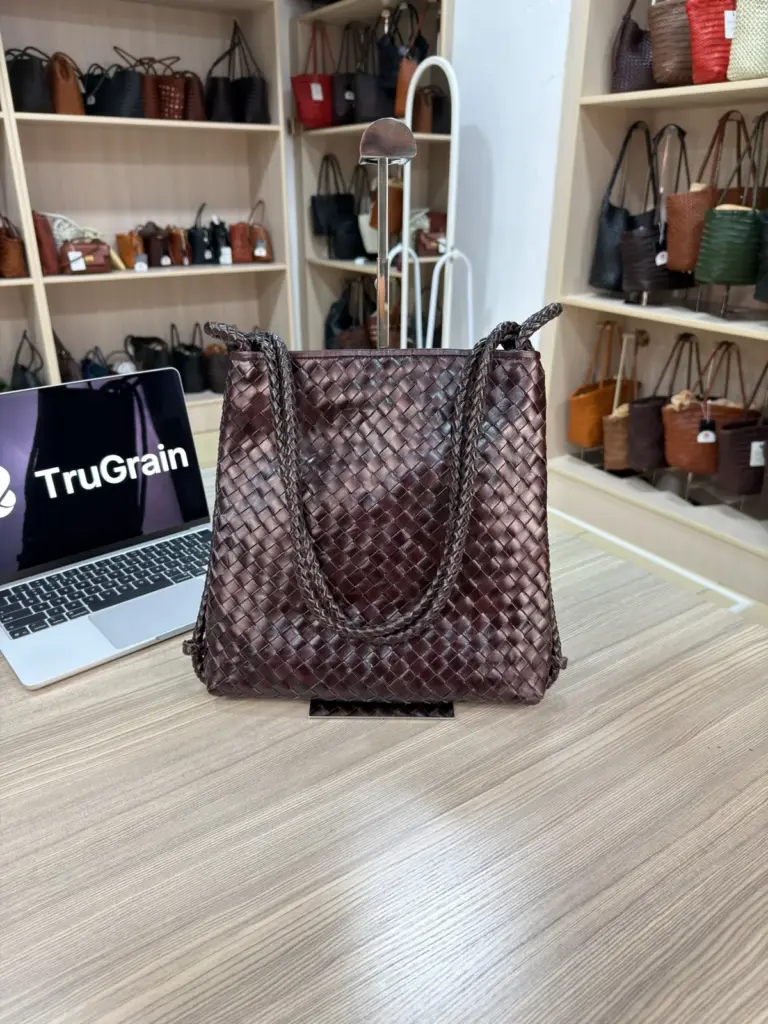 Coffee Brown rectangular woven tote with long handles draped across the front (TG-90978)