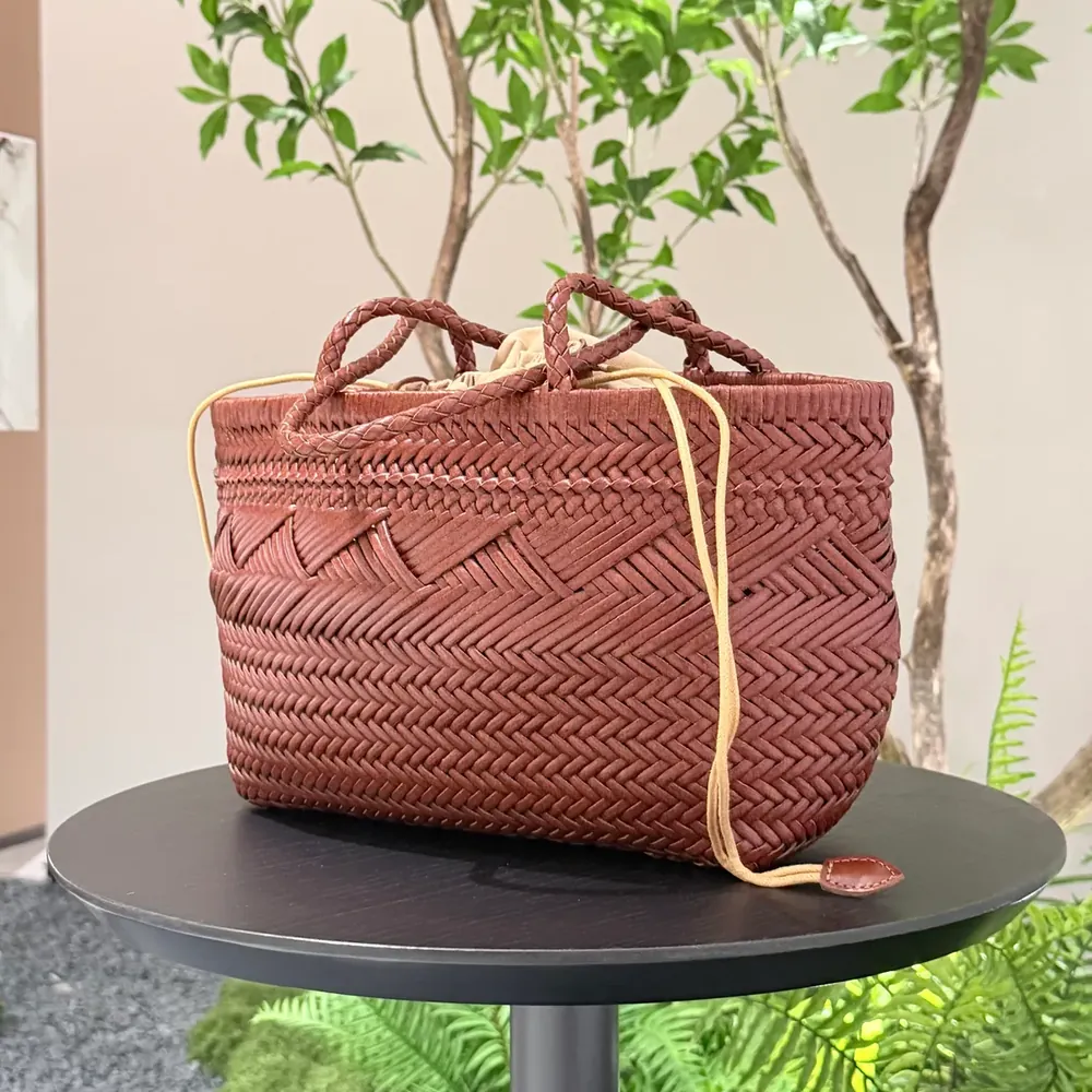 TG-90068 brown woven leather tote with two short handles and different weave patterns, three-quarter view