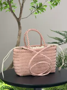 Woven leather handbag in pink